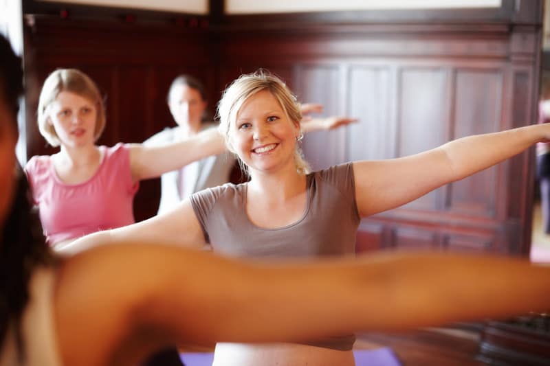 A group of women enjoying a yoga class